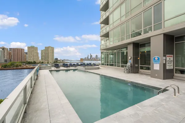 a view of a swimming pool and outdoor space