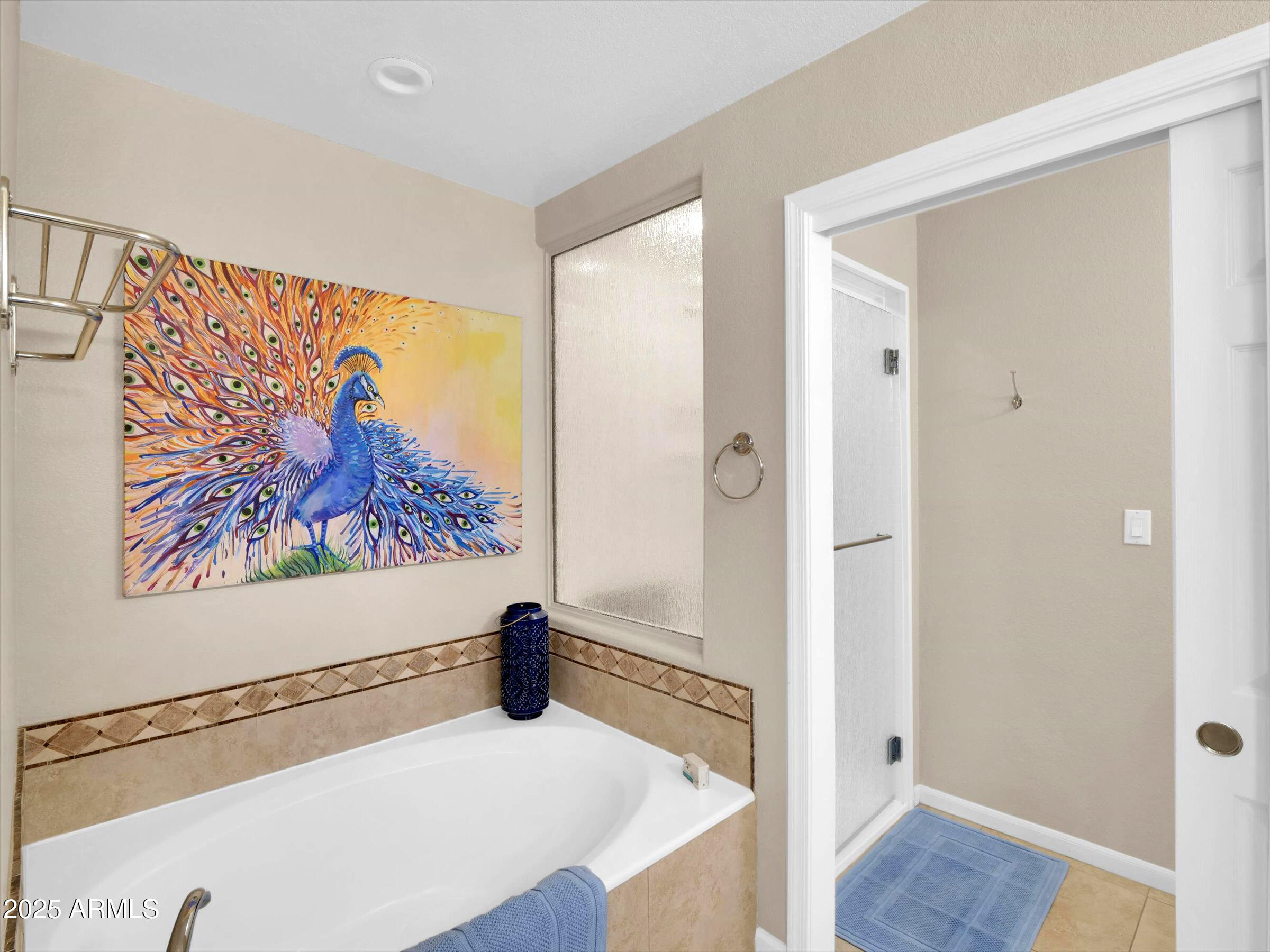 7700 East Gainey Ranch Road, Unit 120 Scottsdale, AZ 85258 - Photo 26 of 57 a view of a hallway with wooden floor and cabinet