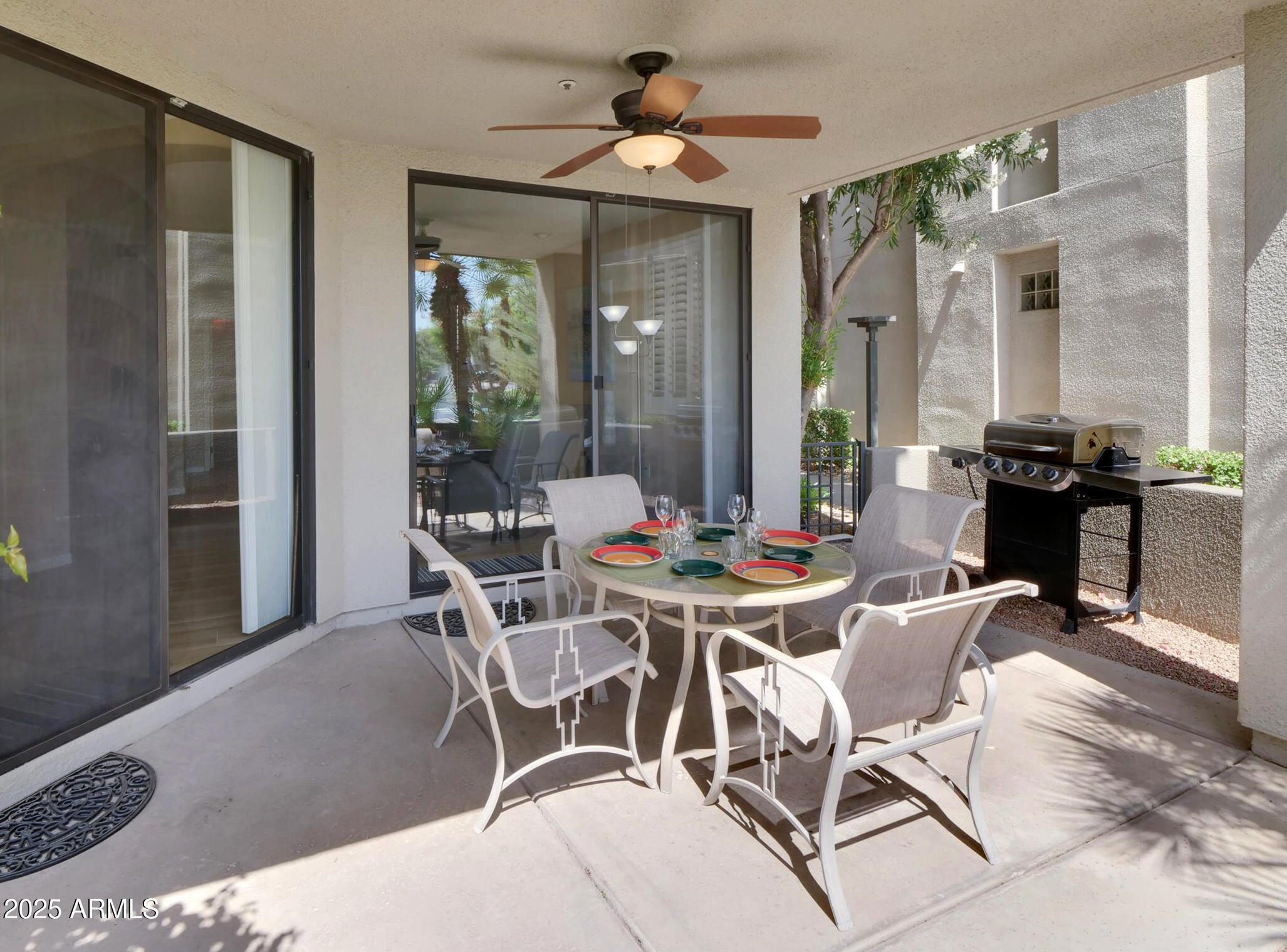 7700 East Gainey Ranch Road, Unit 120 Scottsdale, AZ 85258 - Photo 38 of 57 a view of a dining room with furniture window and outside view