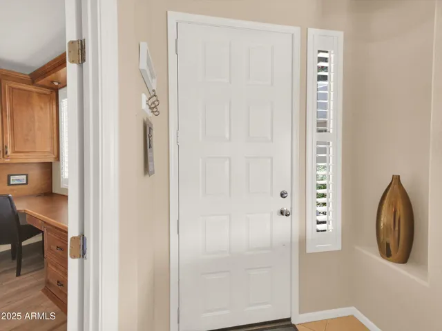 a view of a hallway with washer and dryer