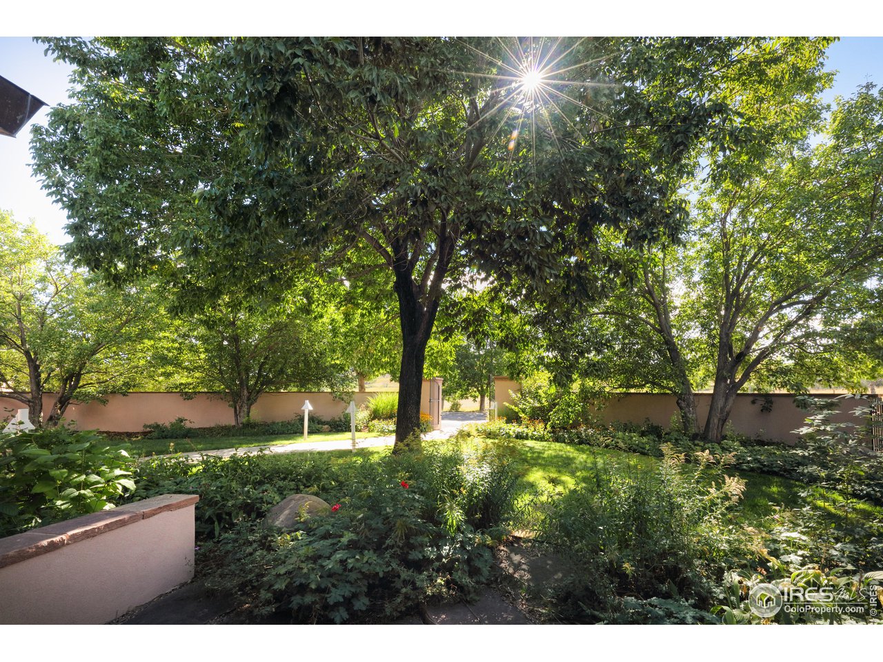 640 South 68th Street Boulder, CO 80303 - Photo 13 of 40 a backyard of a house with lots of green space