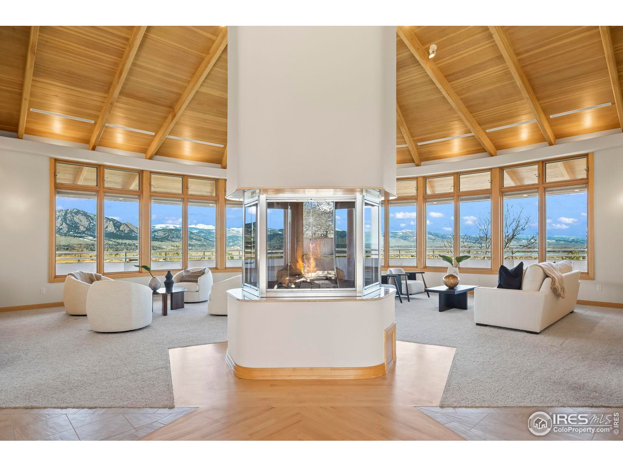 640 South 68th Street Boulder, CO 80303 - Photo 18 of 40 a living room with furniture and large windows