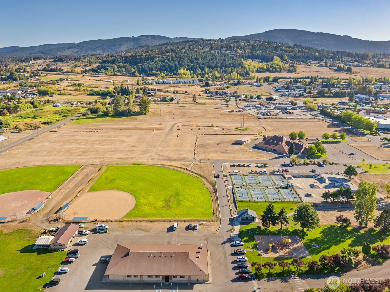 140 Dover Lane Sequim, WA 98382 - Photo 7 of 16 an aerial view of residential houses with outdoor space