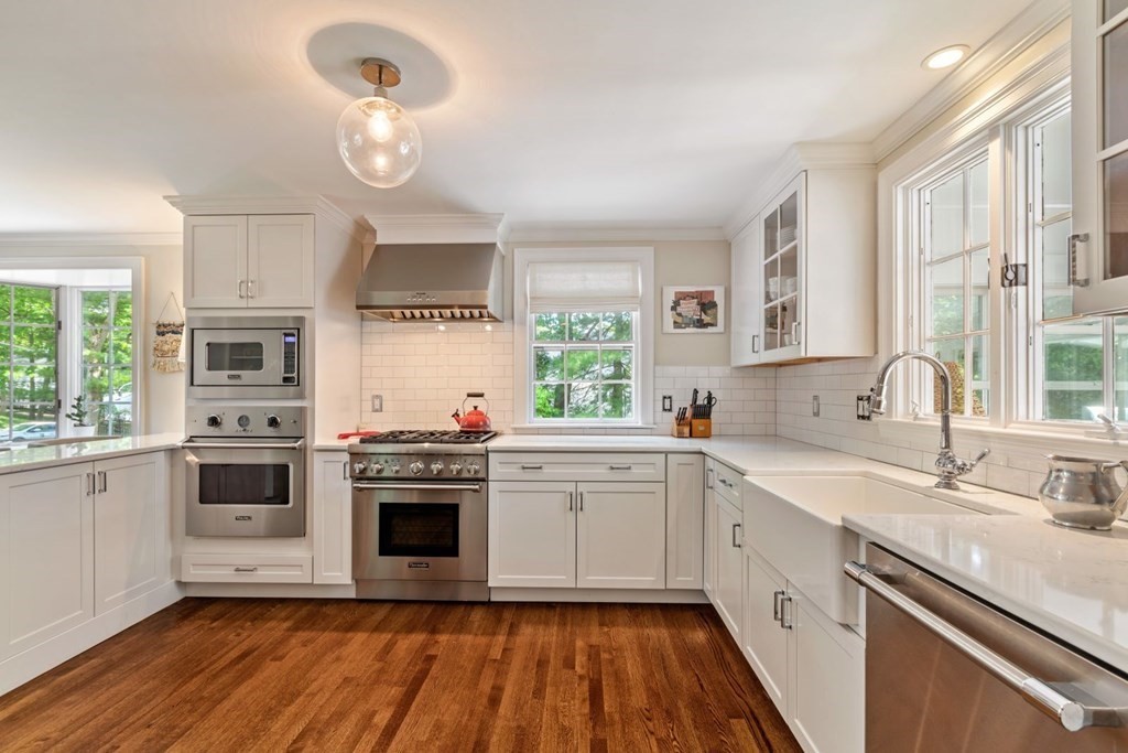 10 Sturbridge Road Wellesley, MA 02481 - Photo 11 of 34 a kitchen with a stove a sink and a refrigerator