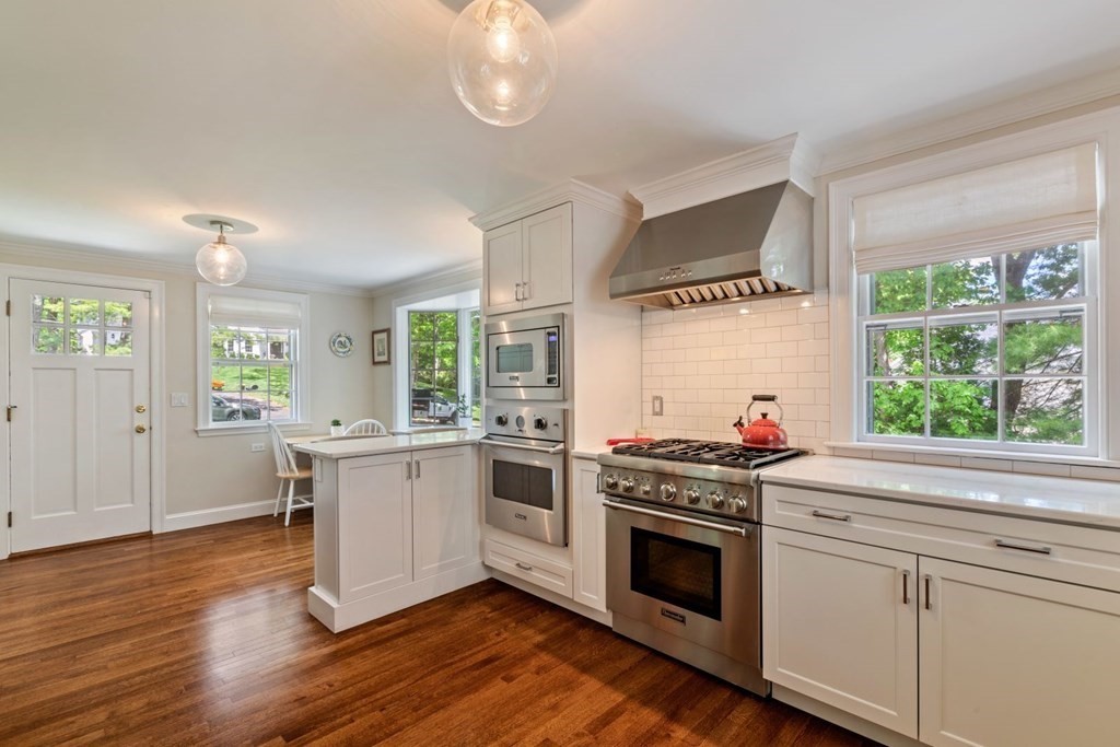 10 Sturbridge Road Wellesley, MA 02481 - Photo 12 of 34 a kitchen with a stove and a wooden floor