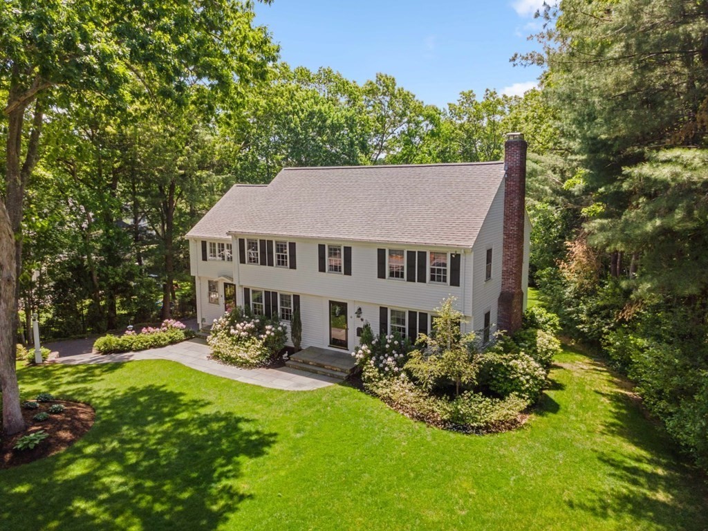 10 Sturbridge Road Wellesley, MA 02481 - Photo 2 of 34 a view of a house with swimming pool and garden