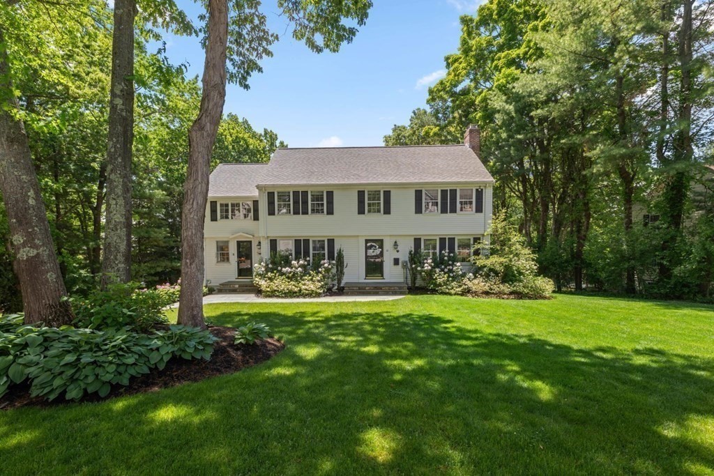 10 Sturbridge Road Wellesley, MA 02481 - Photo 30 of 34 a view of a house with a big yard and large trees