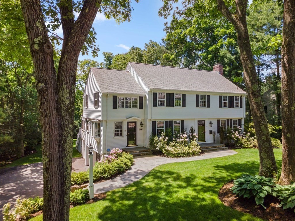 10 Sturbridge Road Wellesley, MA 02481 - Photo 3 of 34 a front view of a house with yard and green space