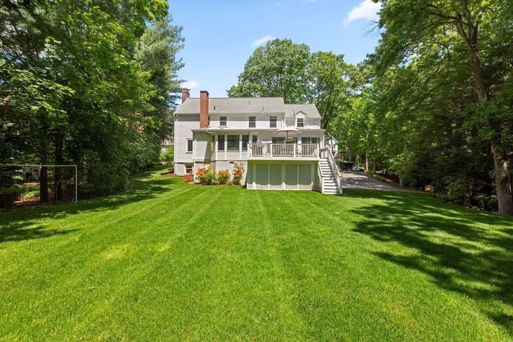 10 Sturbridge Road Wellesley, MA 02481 - Photo 34 of 34 a view of house with a big yard and large trees