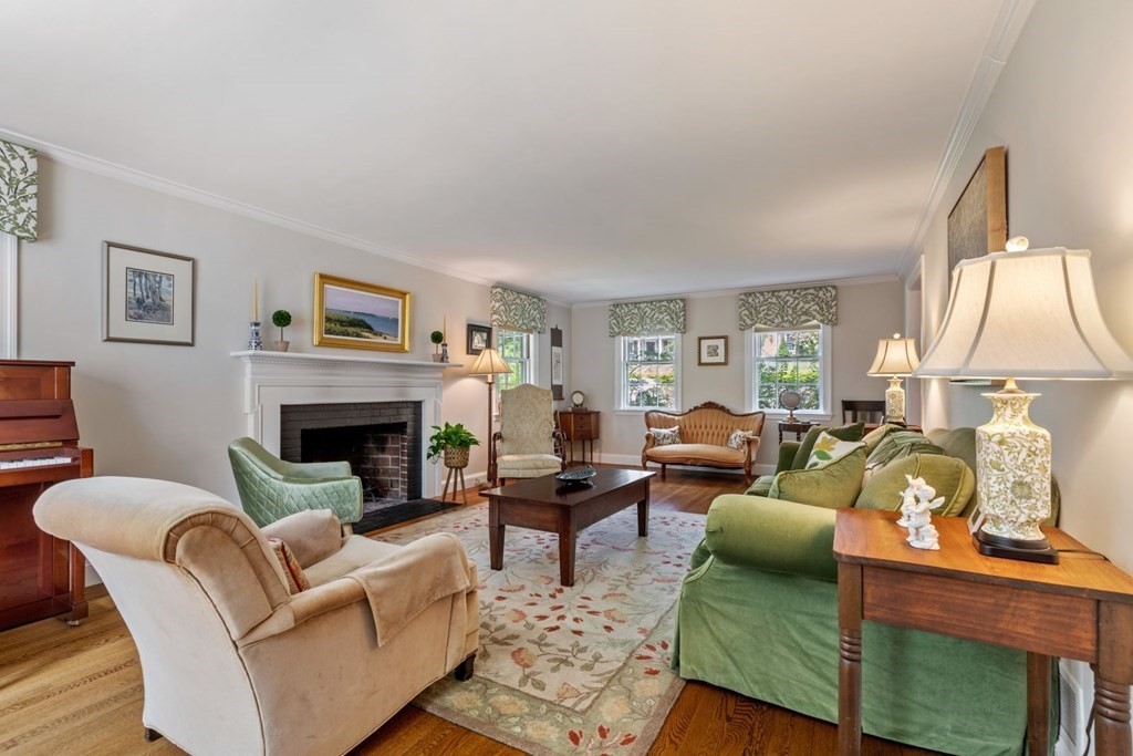 10 Sturbridge Road Wellesley, MA 02481 - Photo 6 of 34 a living room with furniture fireplace and window