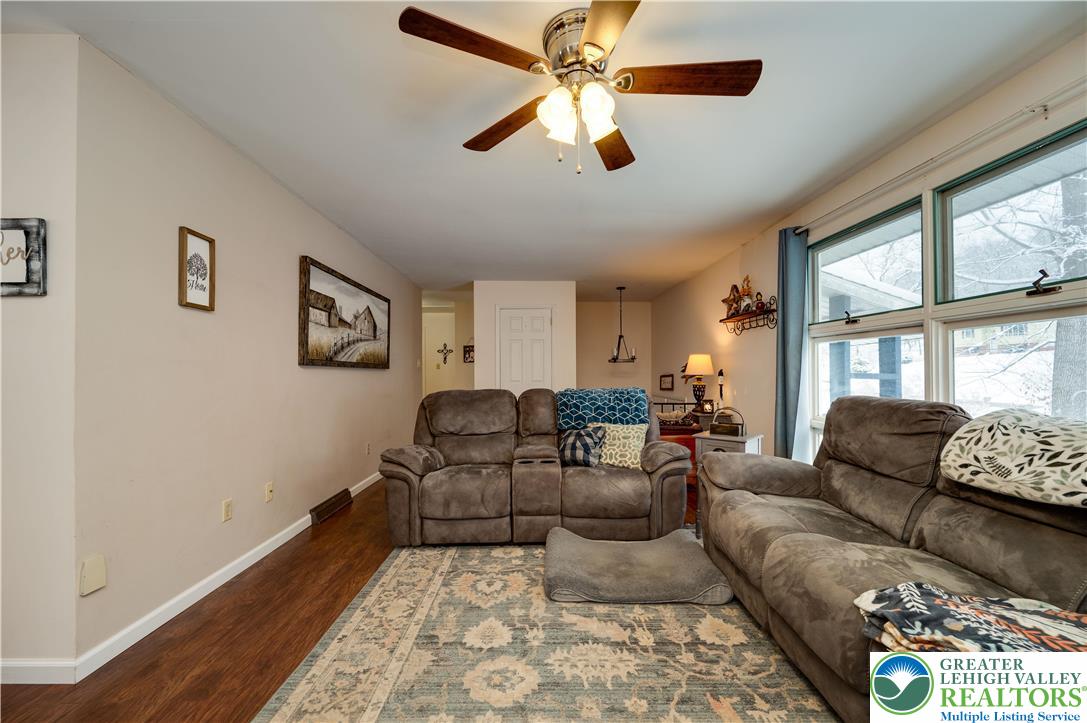 6838 Lime Kiln Road Slatington, PA 18080 - Photo 16 of 60 a living room with furniture and a window