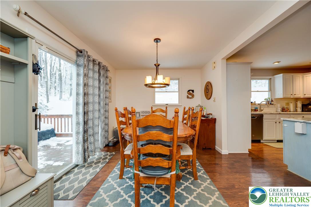 6838 Lime Kiln Road Slatington, PA 18080 - Photo 18 of 60 a dining room with furniture and wooden floor