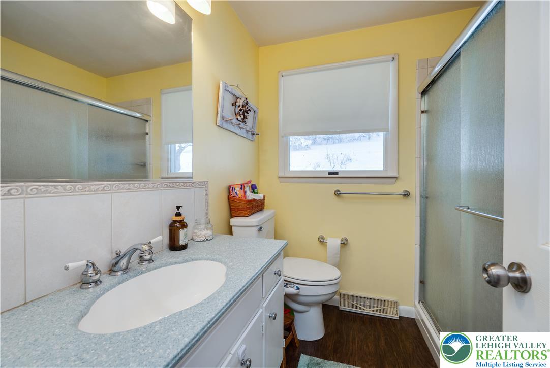 6838 Lime Kiln Road Slatington, PA 18080 - Photo 29 of 60 a bathroom with a sink and a mirror