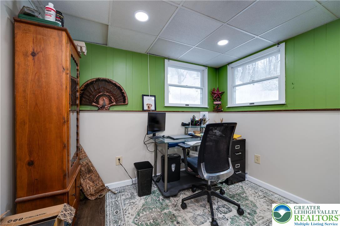 6838 Lime Kiln Road Slatington, PA 18080 - Photo 34 of 60 a work place with a chair and potted plant