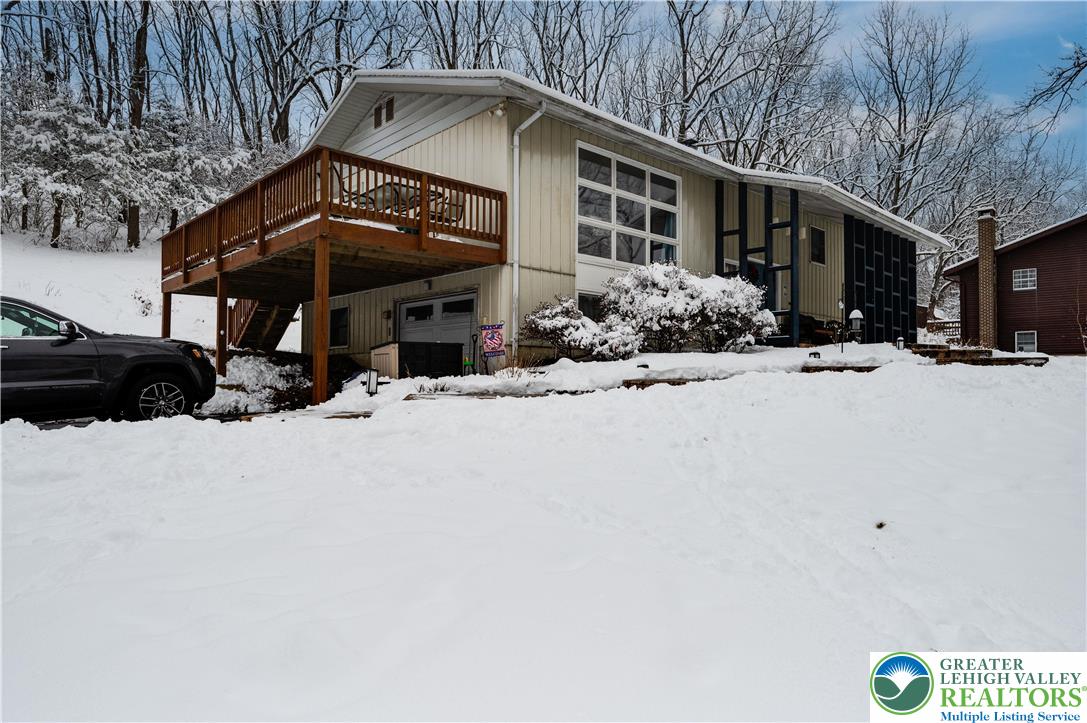 6838 Lime Kiln Road Slatington, PA 18080 - Photo 4 of 60 a view of a house with a snow in snow