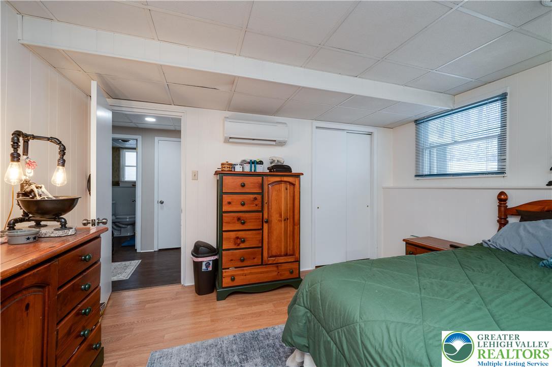 6838 Lime Kiln Road Slatington, PA 18080 - Photo 43 of 60 a bedroom with a bed and furniture