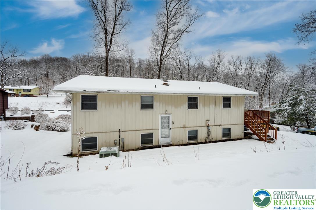 6838 Lime Kiln Road Slatington, PA 18080 - Photo 49 of 60 a view of a white house with a yard