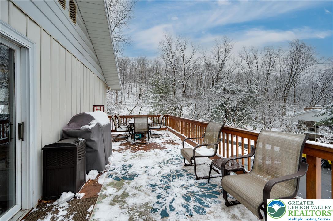 6838 Lime Kiln Road Slatington, PA 18080 - Photo 51 of 60 a backyard of a house with table and chairs