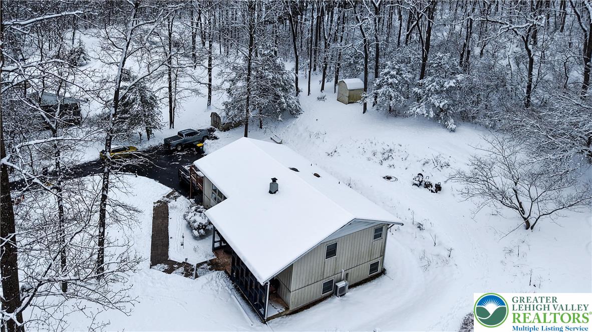 6838 Lime Kiln Road Slatington, PA 18080 - Photo 60 of 60 a view of a backyard with white snow