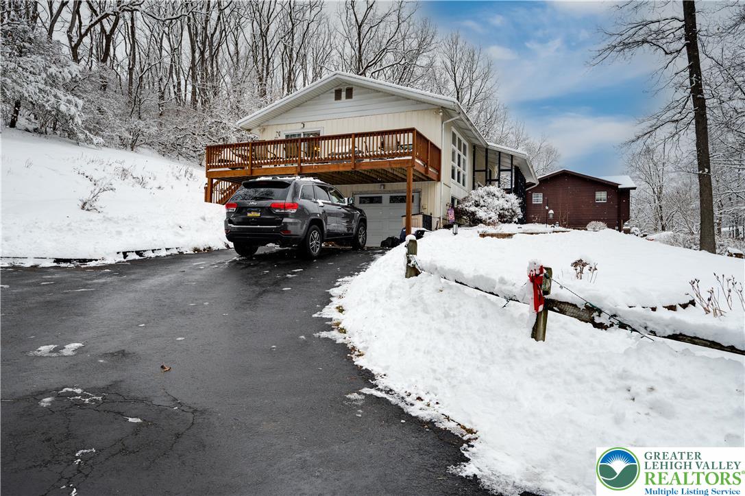 6838 Lime Kiln Road Slatington, PA 18080 - Photo 6 of 60 a car parked on the side of the road
