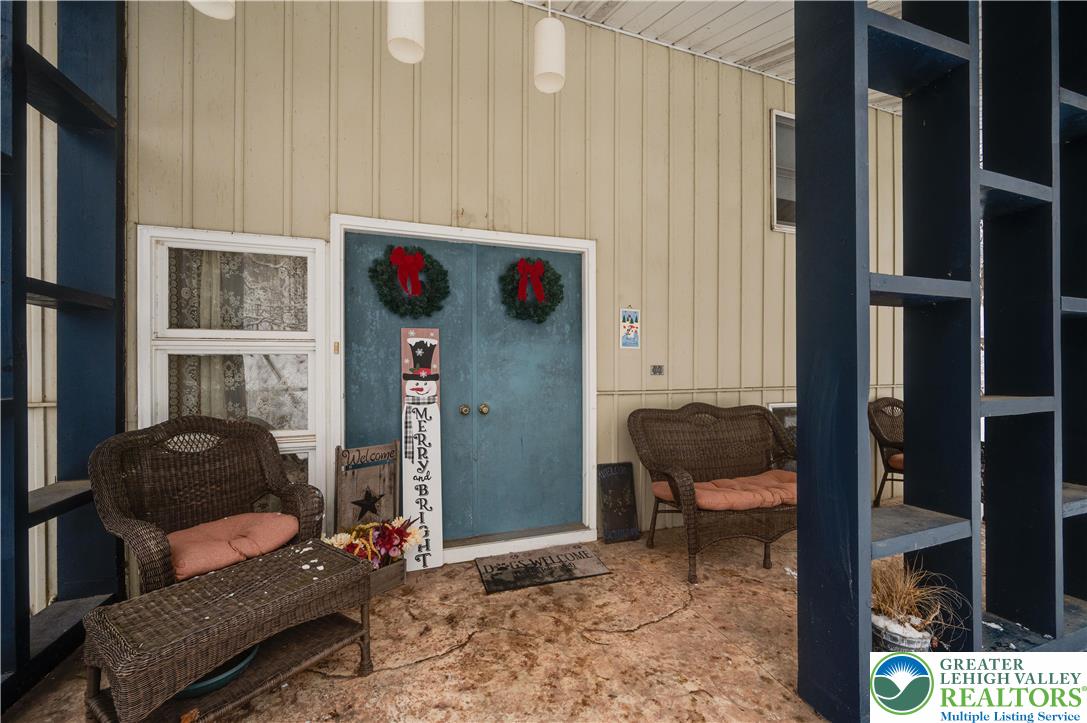 6838 Lime Kiln Road Slatington, PA 18080 - Photo 9 of 60 a living room with furniture and a rug