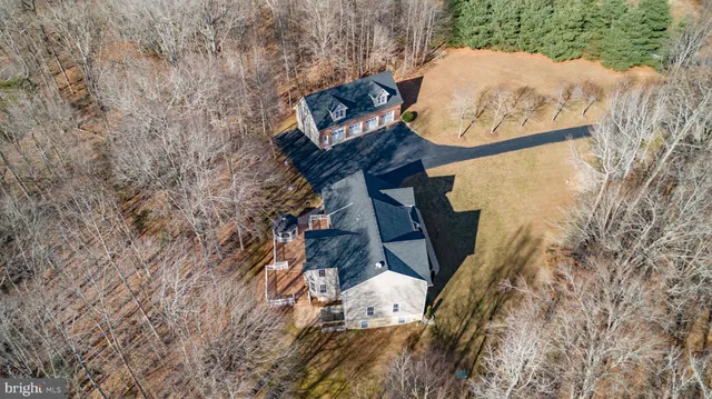 a kitchen with granite countertop a sink and cabinets