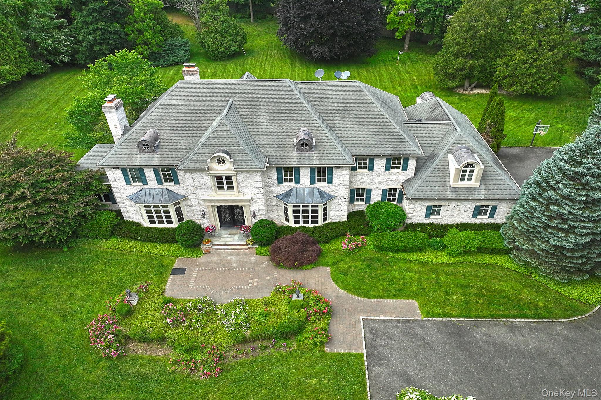 14 Norgate Road Glen Head, NY 11545 - Photo 2 of 44 a aerial view of a house next to a big yard and large trees