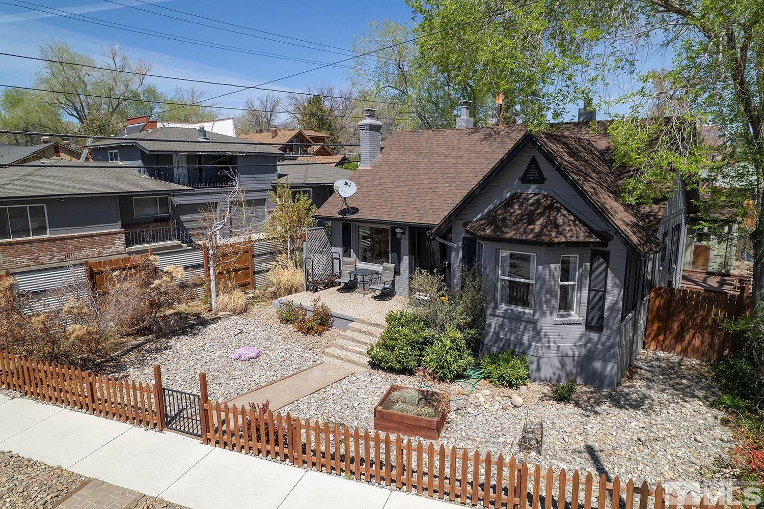 207 Martin Street Reno, NV 89509 - Photo 1 of 40 a front view of a house with a porch