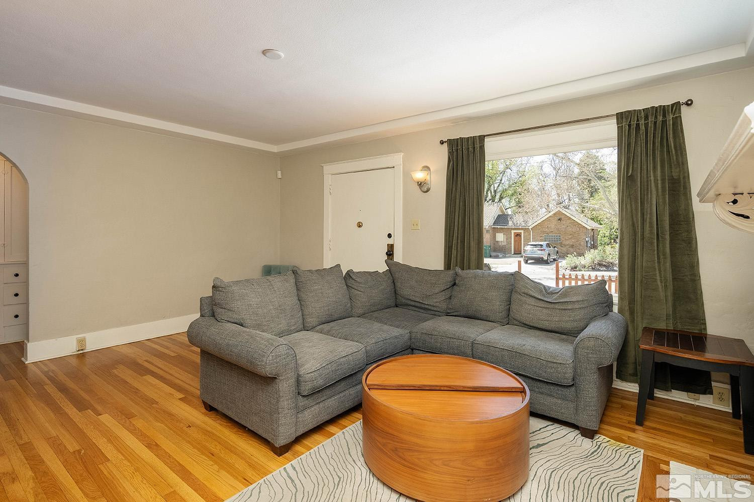 207 Martin Street Reno, NV 89509 - Photo 18 of 40 a living room with furniture and a large window