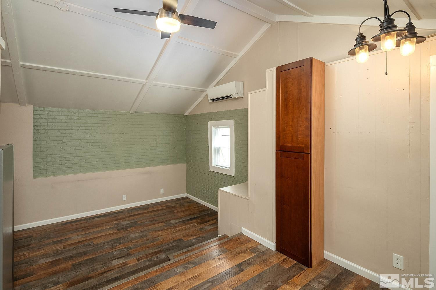 207 Martin Street Reno, NV 89509 - Photo 26 of 40 a view of empty room with wooden floor