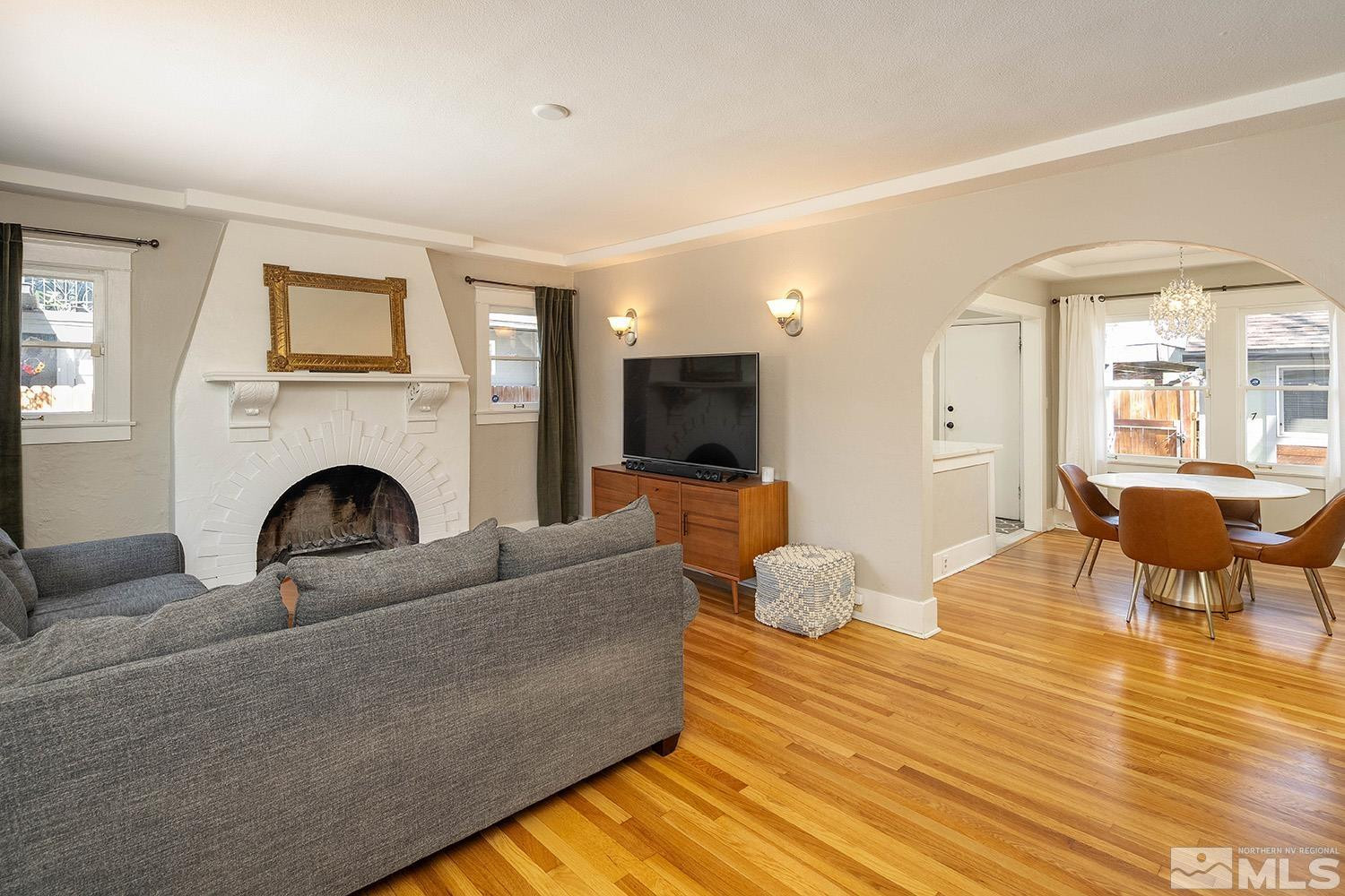 207 Martin Street Reno, NV 89509 - Photo 3 of 40 a living room with furniture and a fireplace