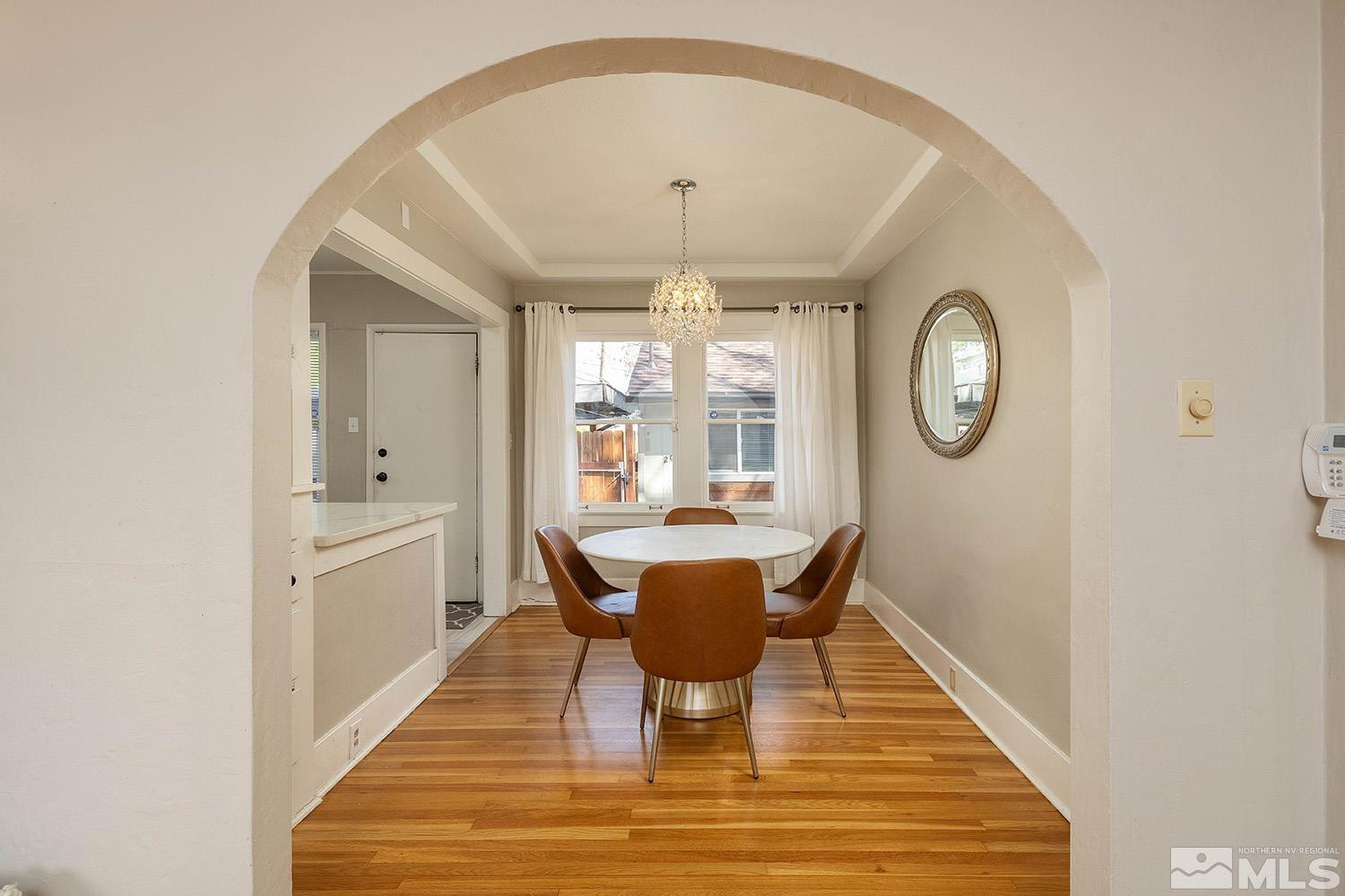 207 Martin Street Reno, NV 89509 - Photo 6 of 40 a view of a dining room with furniture window and wooden floor