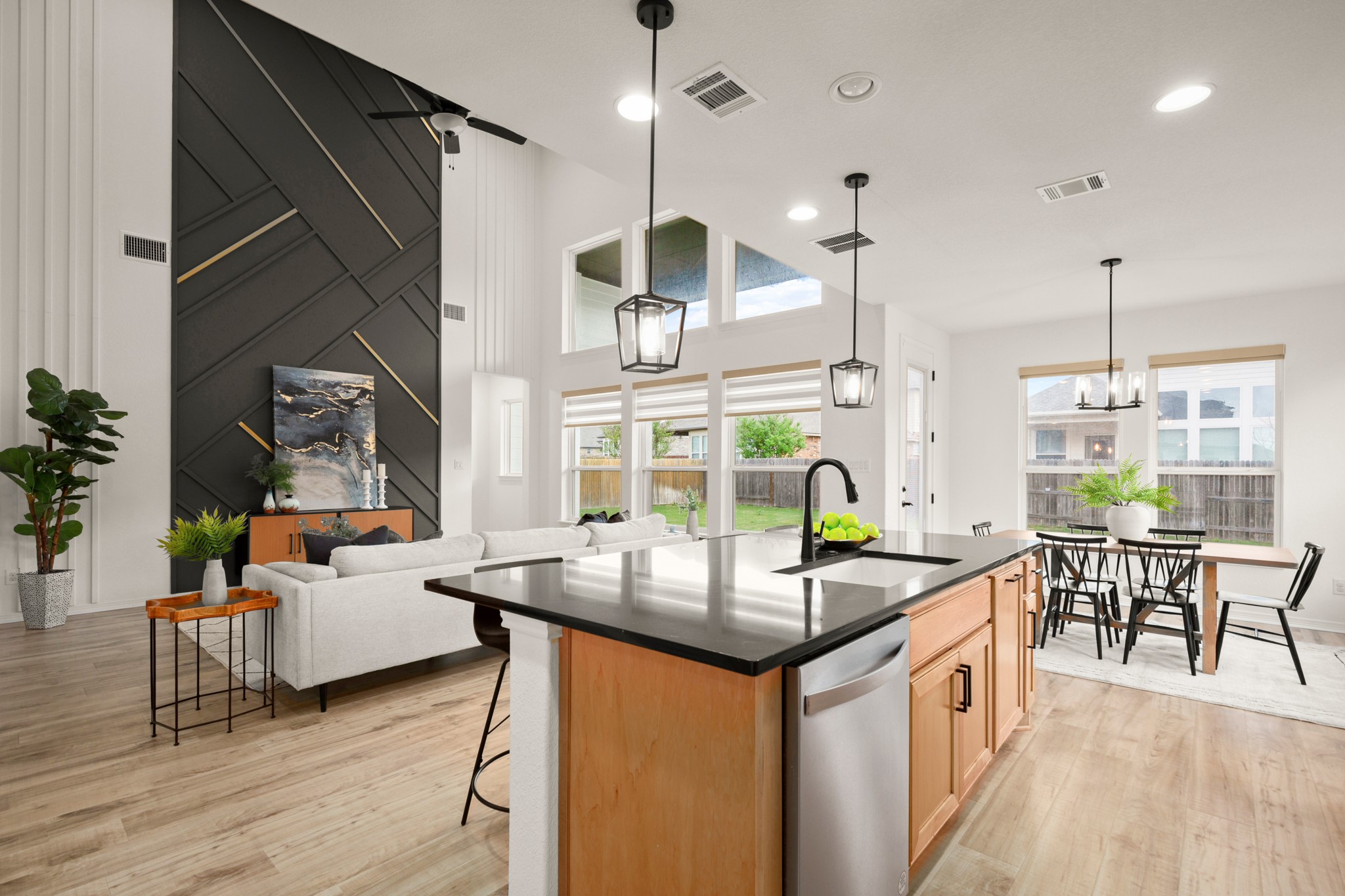 20521 Martin Lane Pflugerville, TX 78660 - Photo 10 of 40 Excellent storage with bountiful natural wood cabinetry complete with and pull-out drawers for pots and pans, plus a cafe counter and pantry along the access point to the dining room.