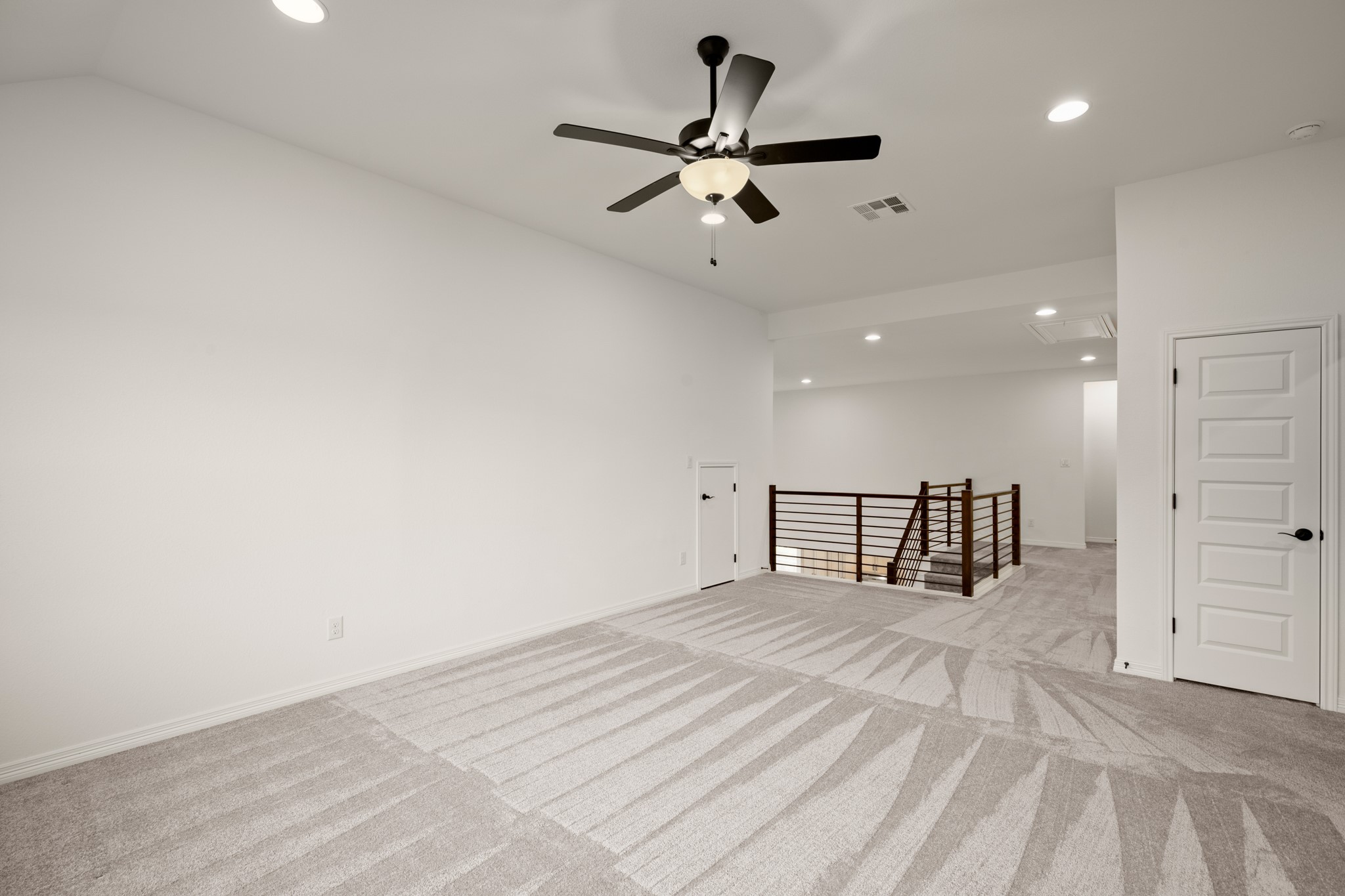 20521 Martin Lane Pflugerville, TX 78660 - Photo 21 of 40 The bonus second floor living area or game room gives you that ideal extra living space allowing space for everyone's daily activities.