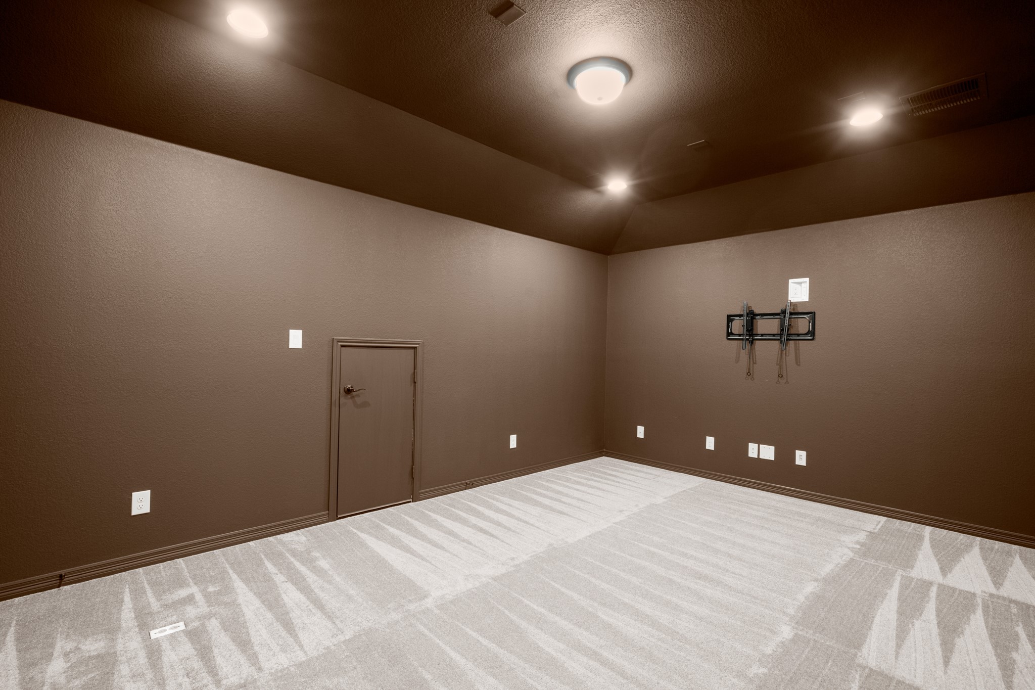 20521 Martin Lane Pflugerville, TX 78660 - Photo 22 of 40 Double doors off the game room open into this awesome media room, already wired for 7.1 surround sound so you can take your movie nights to the next level.