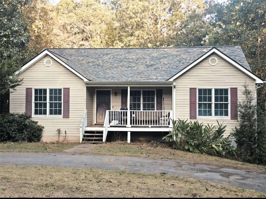 front view of a house with a yard