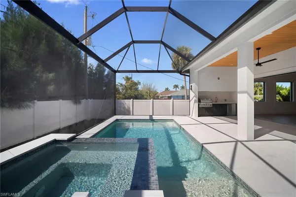 a kitchen with a stove and a sink