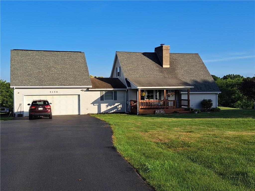 5146 McCandless Road Butler, PA 16001 - Photo 1 of 24 a front view of house with yard and outdoor seating