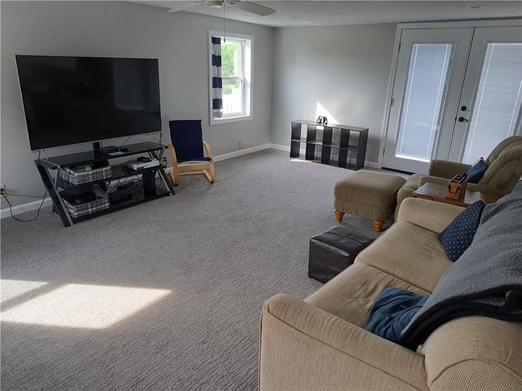 5146 McCandless Road Butler, PA 16001 - Photo 13 of 24 a living room with furniture and a flat screen tv