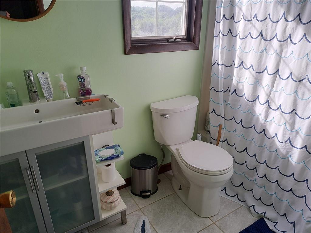 5146 McCandless Road Butler, PA 16001 - Photo 19 of 24 a bathroom with a toilet and a sink
