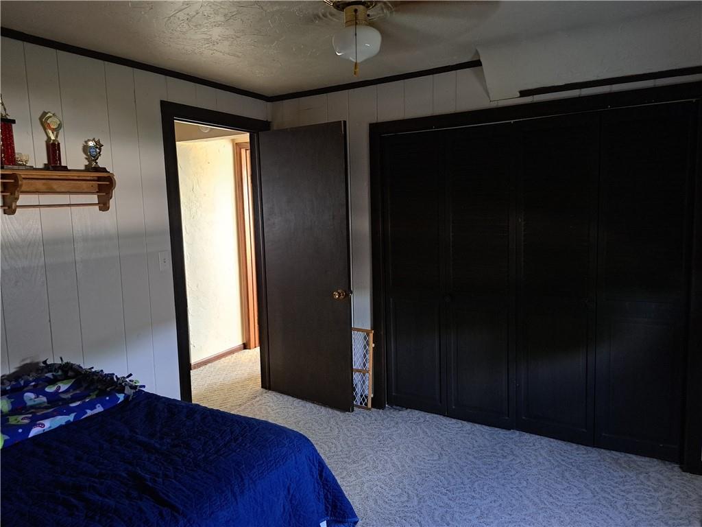 5146 McCandless Road Butler, PA 16001 - Photo 20 of 24 a bedroom with a bed and a dresser