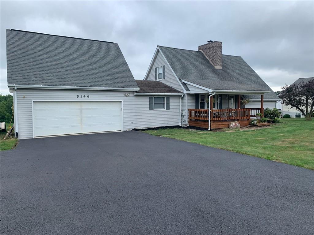 5146 McCandless Road Butler, PA 16001 - Photo 2 of 24 front view of house with a yard