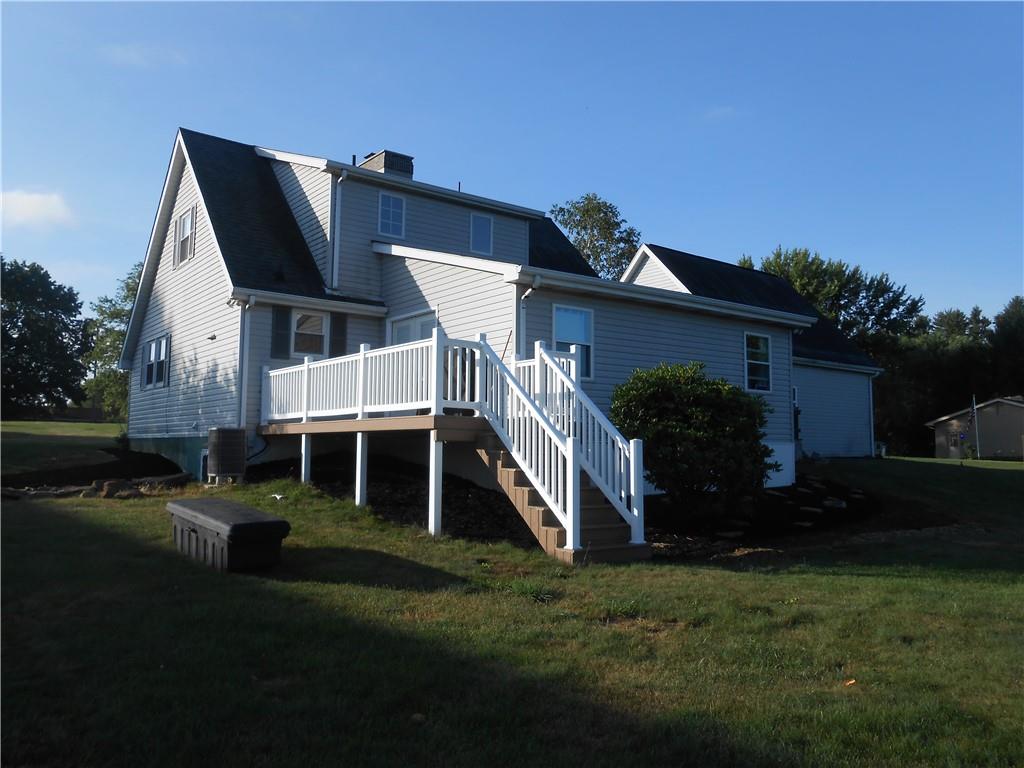 5146 McCandless Road Butler, PA 16001 - Photo 3 of 24 a front view of a house with a garden