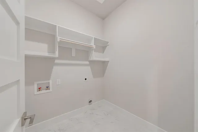 an empty room with a empty space and windows