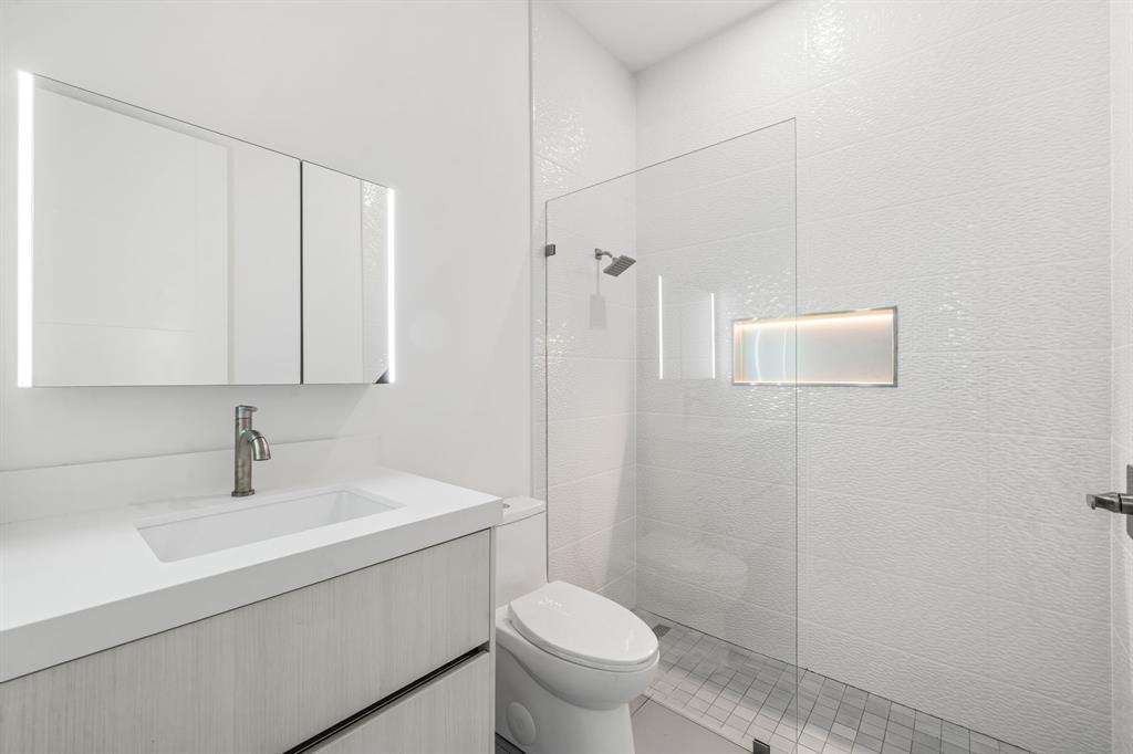 18851 42nd Road North Loxahatchee, FL 33470 - Photo 13 of 22 a bathroom with a sink toilet and shower