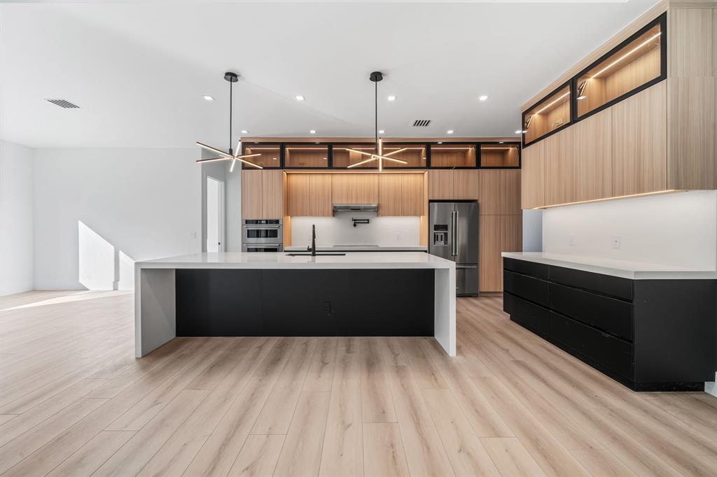 18851 42nd Road North Loxahatchee, FL 33470 - Photo 2 of 22 a bathroom with a sink vanity and a mirror