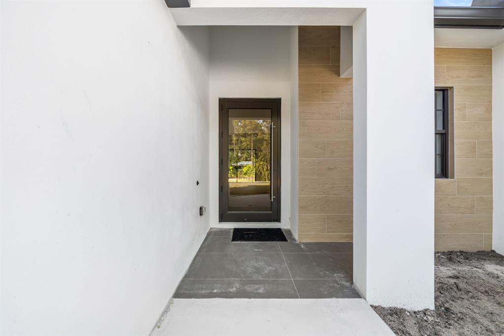 18851 42nd Road North Loxahatchee, FL 33470 - Photo 21 of 22 a view of front door