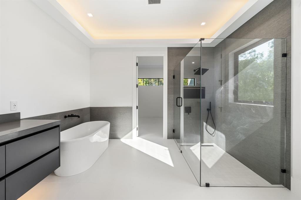 18851 42nd Road North Loxahatchee, FL 33470 - Photo 3 of 22 a bathroom with a toilet and a shower