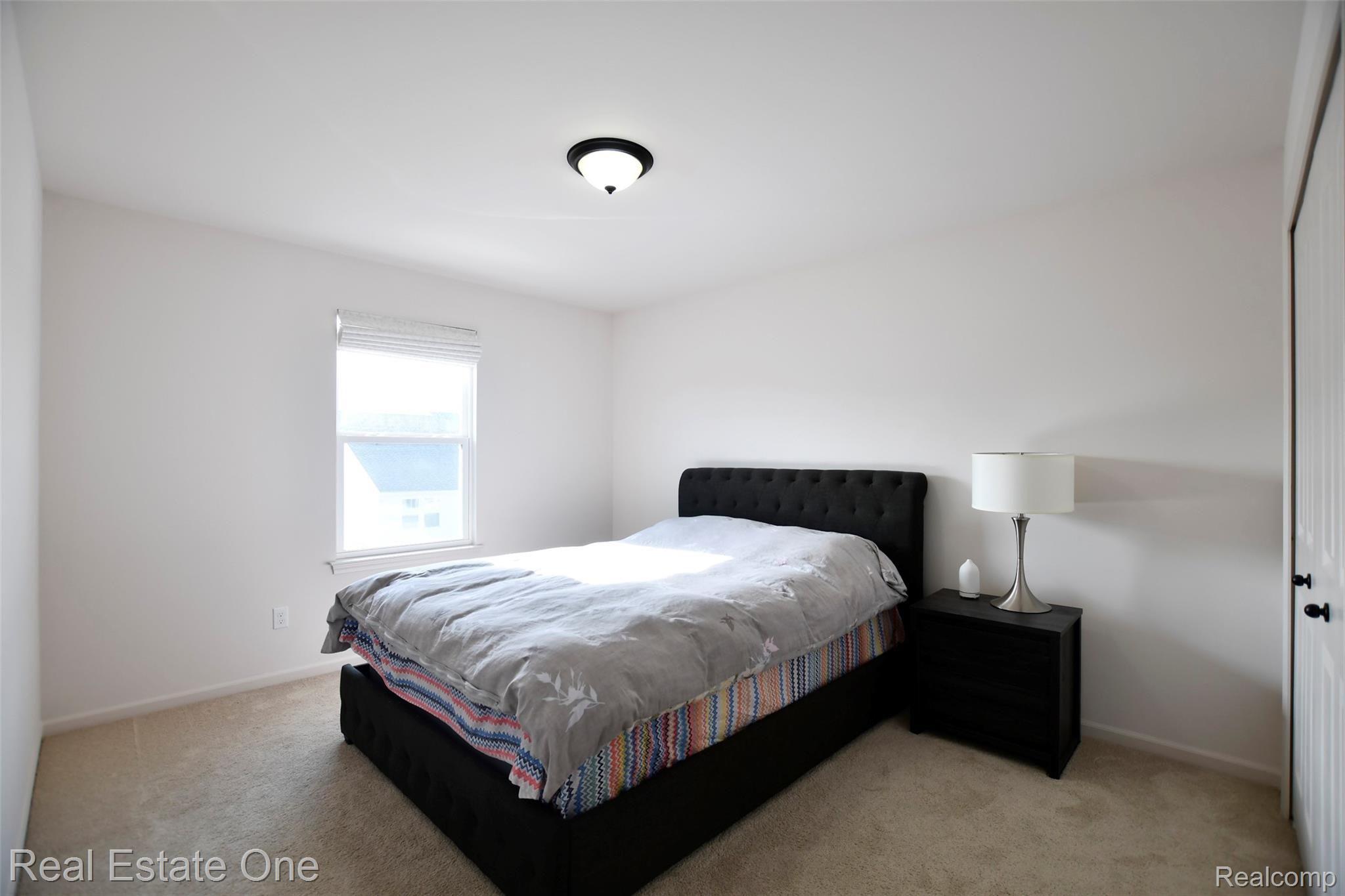3087 Curtis Road Wixom, MI 48393 - Photo 21 of 36 Guest Bedroom.jpg