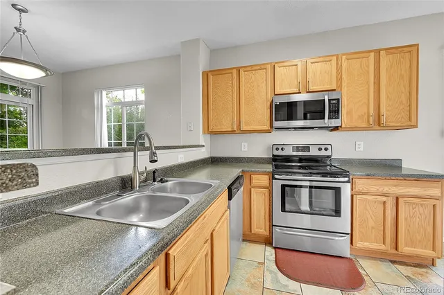 $395,000 | 14400 Albrook Drive, Unit 10, Denver, CO 80239